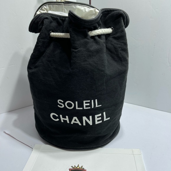 Authentic CHANEL Bucket Backpack Black Canvas Drawstring  Chanel Rucksack Drawstring Pool Bag in Black Canvas.